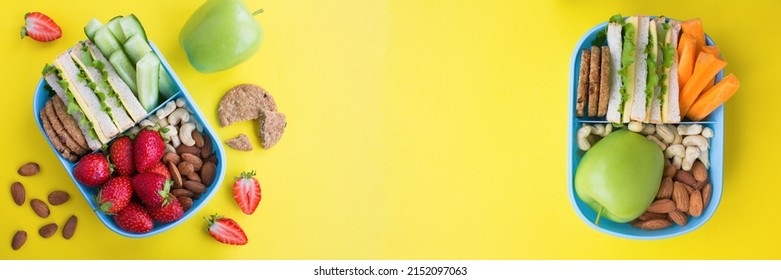 Banner. School Lunch In The Blue Box On The Yellow Background. Top View. Copy Space.