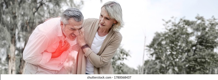 Banner Of Senior Man Suffering, Clutching And Having Difficult Breathing, Chest Pain Or Heart Attack During Coronavirus Pandemic Crisis, Wife Help And Support Her Husband, Life And Living Insurance