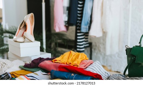 banner swap party for try on clothes, bags, shoes and accessories, friends change clothes, second hand and zero waste life, eco-friendly approach to consumption, clothes hanger in loft interior - Shutterstock ID 2178127013