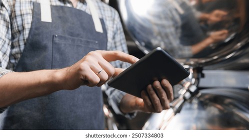 Banner technology on brewery factory. Worker man in apron use digital computer tablet for control quality of beer drink tank. - Powered by Shutterstock