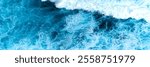 Banner Turquoise ocean sea water white wave pattern splashing deep blue sea. Banner Tropical sea beach Seascape dark background wave splash on rock. Summer Ocean Surface big wave with copy space