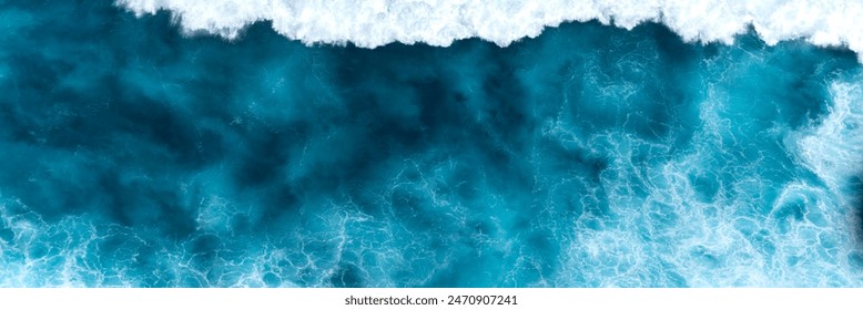 Banner Turquoise ocean sea water white wave pattern splashing deep blue sea. Banner Tropical sea beach Seascape dark background wave splash on rock. Summer Ocean Surface big wave with copy space - Powered by Shutterstock