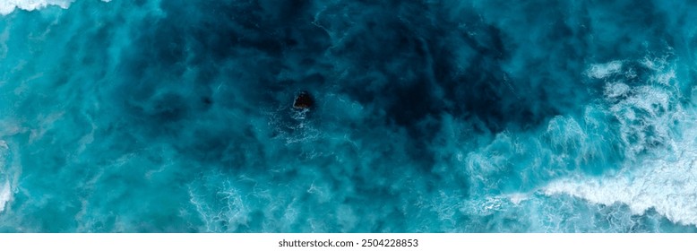 Banner Turquoise ocean sea water white wave pattern splashing deep blue sea. Banner Tropical sea beach Seascape dark background wave splash on rock. Summer Ocean Surface big wave with copy space - Powered by Shutterstock