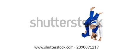 Banner. Two men professional judoist training, fighting performs technical skill isolated white studio background. Concept of martial art, combat sport, health, strength, energy, fit. Copy space