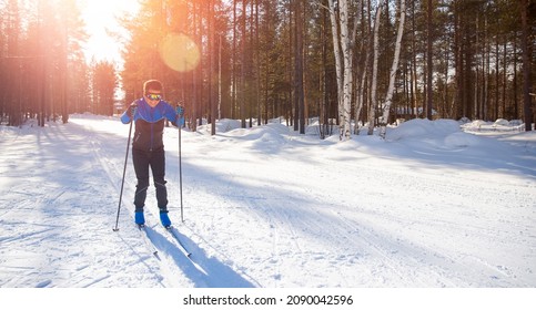 Banner Winter Sports Cross Of Country Skis On Fresh Snow On Sunny Morning Day.