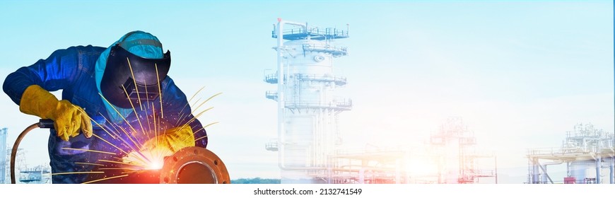 Banner Worker Welder Is Welding Industrial On Metal Steel Pipe Repair With Spark Light Wearing Equipment Protective Leather Glove Welded Mask, Panorama Copy Space Oil Refinery Plant Background.