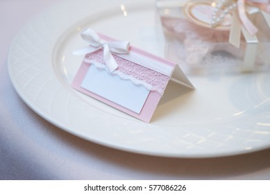 Banquet Wedding Table Setting On Evening Reception With Name Card On White Plate.copy Space