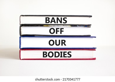 Bans off our bodies symbol. Concept words Bans off our bodies on books on a beautiful white table white background. Women rights concept. Business social issues and bans off our bodies concept.
