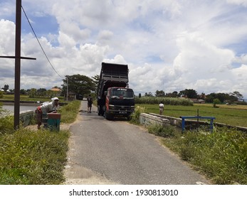 Bantul, Indonesia March 7, 2021 At Noon A Dumb Truck Is Being Cleaned