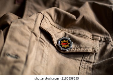 Banwell, North Somerset, Uk. July 20th 2022. Old BSA Badge On Jacket. A Period 1960's BSA Motorcycles Badge On A Tan Denim Jacket. Retro Biker Look. Classic English Motorcycle. Classic Pin Biker Badge