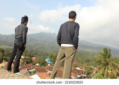 Banyumas, Indonesia - October 5, 2022 : A Photo Of An Asian Man Standing And Not Facing The Camera