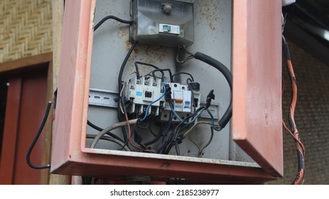 Banyuwangi, Indonesia - July 23, 2022 : Prepaid Electricity Meter For Home Provided By PLN (Indonesian Government Electricity Company), Electric Meter By Itron And Schneider Electric