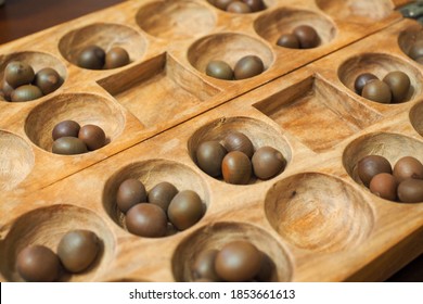 Bao Is A Traditional Mancala Board Game.