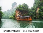 Baofeng Lake Boat Trip in a rainy day with clouds and mist at Wulingyuan, Zhangjiajie National Forest Park, Hunan Province, China, Asia