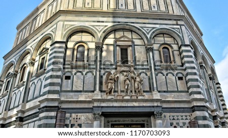 The Baptistery is one of the oldest buildings in Florence Italy. 4th century. Iconic octagonal basilica with striking marble facade, known for its bronze doors and mosaic ceiling. Italy, Florence 