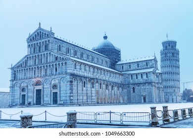 Baptistery Of Pisa After A Winter Snowfall. Square Of Miracles At Dawn.