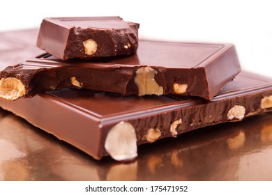 The Bar Of  Brown Milk Chocolate With Peanuts