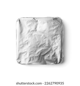 A bar of chocolate is wrapped in silver foil on a white background top view. Chocolate in foil packaging on isolation.