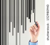 Bar code designer, businessman drawing bar code with marker pen.
