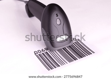 Bar code scanner with the bar code isolated on the white backgro