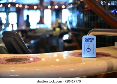 Bar Counter And A Special Needs Sign At Cruise Ship