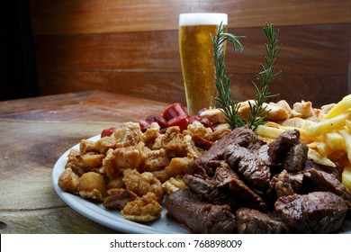 Bar Food With Meat, Sausage, Potato Chips, Crackers, Chicken And Cold Beer