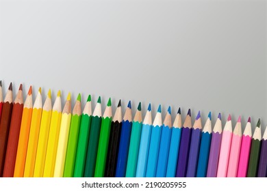 Bar Graph Formed From Colored Pencils Showing Fluctuations With A General Uptrend Concept