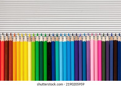 Bar Graph Formed From Colored Pencils Showing Fluctuations With A General Uptrend Concept