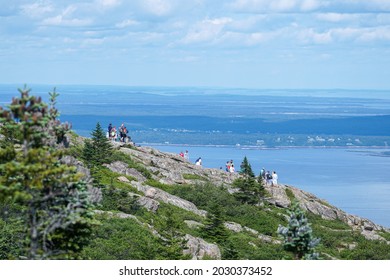 Bar Harbor, Maine, USA - July 22nd, 2021: Acadia National Park - Crowds Of People Looking Out Over The Ocean From The Summit Of Cadillac Mountain.