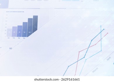 Bar and line graphs show monthly growth in customer acquisition and performance trends, indicating business progress and data analysis. - Powered by Shutterstock - Get 15% off with code: PIKWIZARD15
