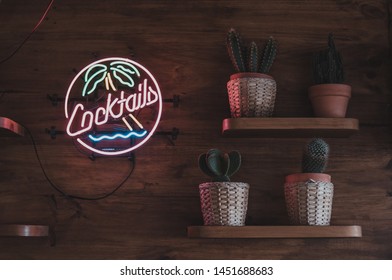 Bar Neon And Cactus In The Beach
