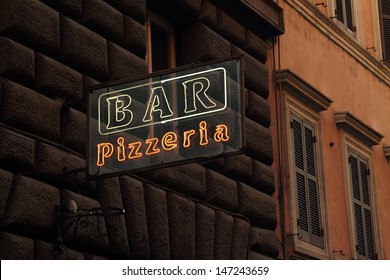 Bar And Pizza Sign In Italy