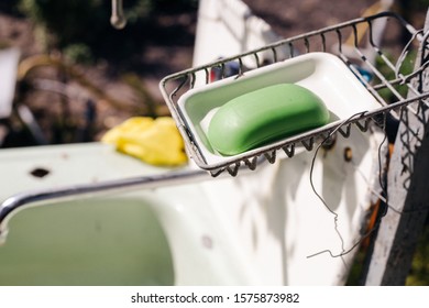 Bar Of Soap In An Old Soap Box. Dry Leaves Fell Into The Soap Box.