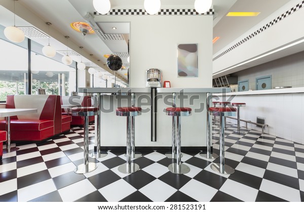 bar stools in a\
american diner restaurant