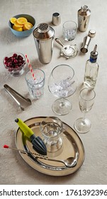 Bar Tools, Shaker And Cocktail Glasses, Mixology Tools On A White Table