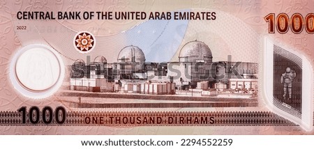 Barakah Nuclear Energy Plant in Abu Dhabi and foil stripe with astronaut. Portrait from United Arab Emirates 1000 Dirhams 2023 Banknotes. 