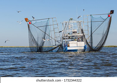 BARATARIA BAY, LA, USA - OCTOBER 26, 2014: Shrimp Boat In Barataria Bay, Louisiana