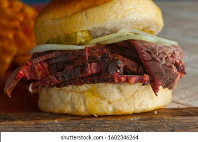 Barbecue Beef Brisket Sandwiches. BBQ Traditional Texas Barbecue Sandwiches. Pulled Pork. Thick Sliced Smoked Beef Brisket. Chopped Beef Brisket With Barbecue Sauce Bbq Sauce. Served On White Buns.