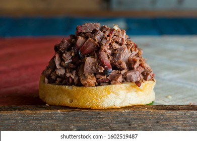 Barbecue Beef Brisket Sandwiches. BBQ Traditional Texas Barbecue Sandwiches. Pulled Pork. Thick Sliced Smoked Beef Brisket. Chopped Beef Brisket With Barbecue Sauce Bbq Sauce. Served On White Buns.