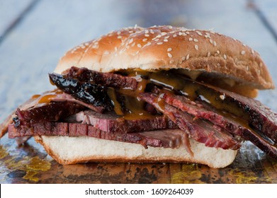 Barbecue Beef Brisket Sandwiches. BBQ Traditional Texas Barbecue Sandwiches. Pulled Pork. Thick Sliced Smoked Beef Brisket. Chopped Beef Brisket With Barbecue Sauce Bbq Sauce. Served On White Buns.