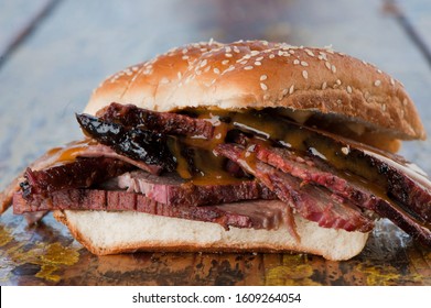 Barbecue Beef Brisket Sandwiches. BBQ Traditional Texas Barbecue Sandwiches. Pulled Pork. Thick Sliced Smoked Beef Brisket. Chopped Beef Brisket With Barbecue Sauce Bbq Sauce. Served On White Buns.