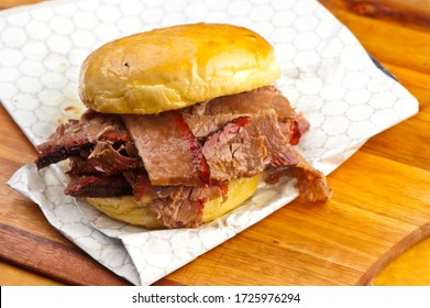 Barbecue Beef Brisket Sandwiches. BBQ Traditional Texas Barbecue Sandwiches. Pulled Pork. Thick Sliced Smoked Beef Brisket. Chopped Beef Brisket With Barbecue Sauce Bbq Sauce. Served On White Buns.