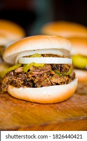 Barbecue Beef Brisket Sandwiches. BBQ Traditional Texas Barbecue Sandwiches. Pulled Pork. Thick Sliced Smoked Beef Brisket. Chopped Beef Brisket With Barbecue Sauce Bbq Sauce. Served On White Buns.