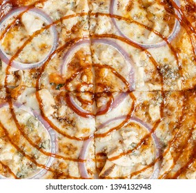 Barbecue Chicken Pizza With Sauce, Mozzarella Cheese, Fresh Red Onions And A Sauce Swirl Served In A Portland, Oregon Restaurant.