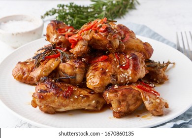 Barbecue Chicken Wings. Slow Cooker Sweet And Spicy. Oven Baked Marinated Chiken On Plate In Bbq Red Sauce. Hot Korean Food. Side View, Close Up