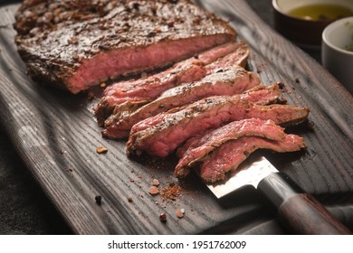 Barbecue dry aged wagyu flank steak sliced. 