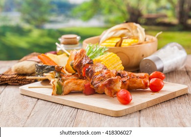 Barbecue in garden at summer