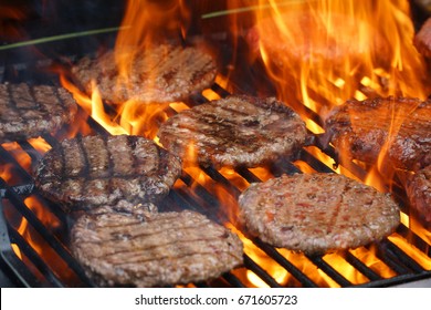 Barbecue Grill Cooking Burger Steak On The Fire