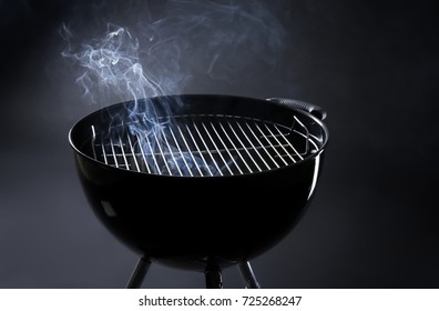 Barbecue grill on dark background - Powered by Shutterstock