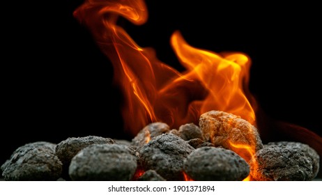 Barbecue Grill Pit With Glowing And Flaming Hot Charcoal Briquettes, Close-Up